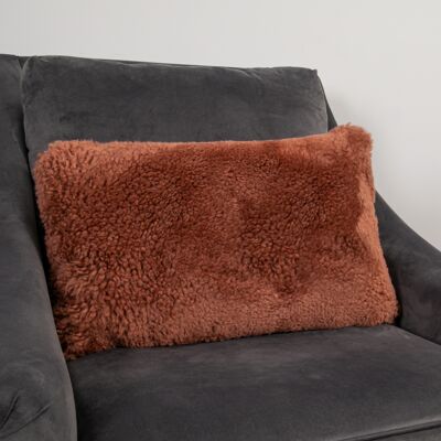 Coussin en peau de mouton à poils courts corail