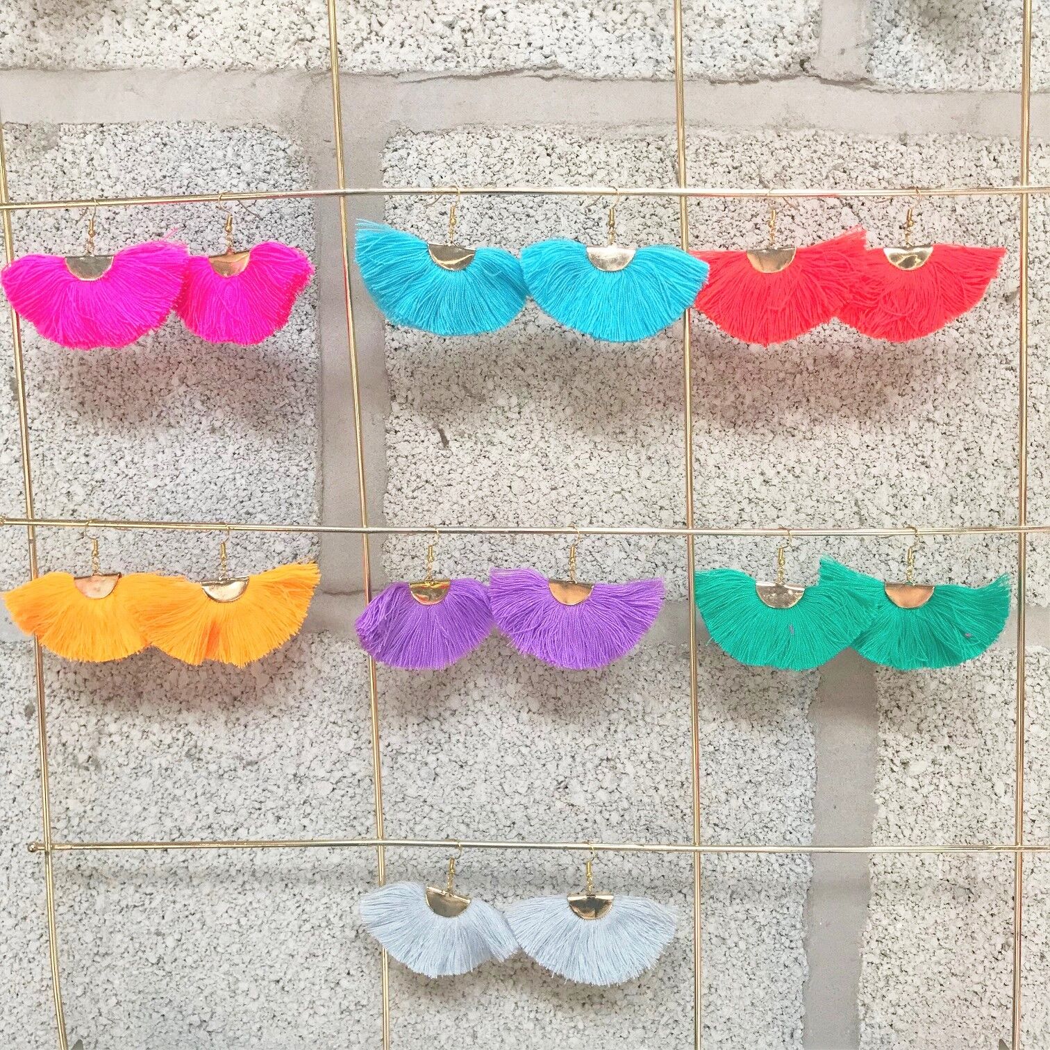 Orecchini a ventaglio con nappe lilla