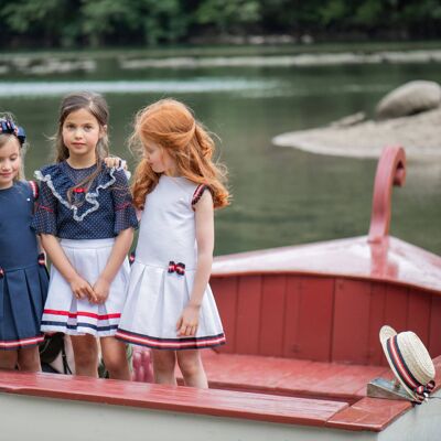 NAVY SKIRT WITH YELLOW AND WHITE TRIM