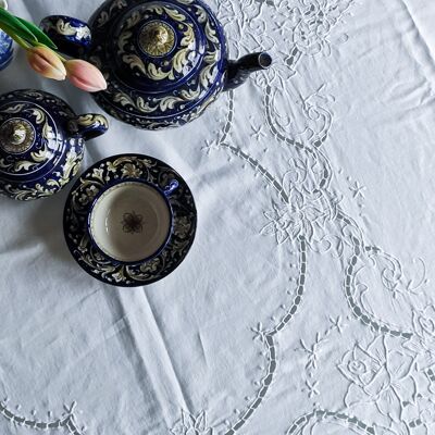 White linen tablecloth with cutwork embroidery