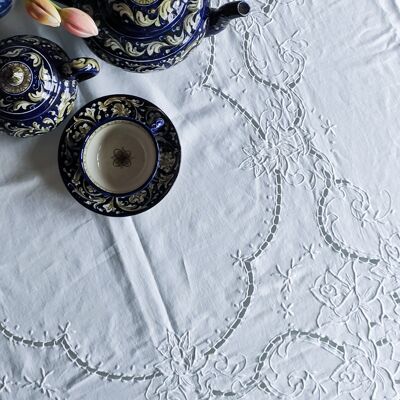 White linen tablecloth with cutwork embroidery