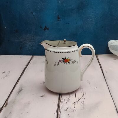 Porcelain jug and metal lid