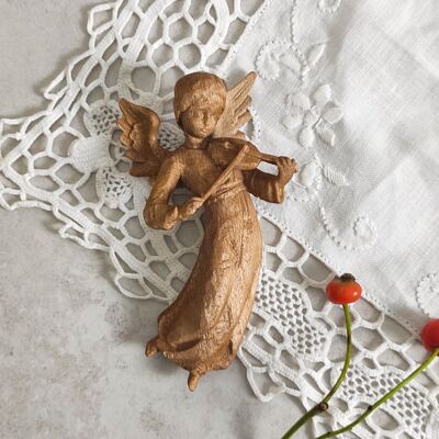 Small hand carved wooden angel