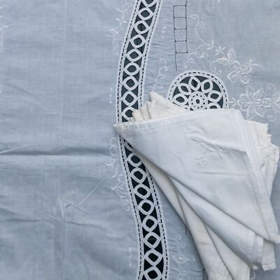White linen tablecloth with crochet embroidery