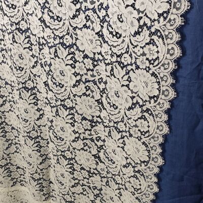 Pair of white lace curtains