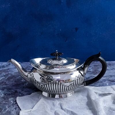 sheffield teapot with embossed wave decoration