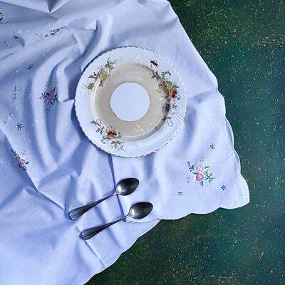white linen tea placemat and roses