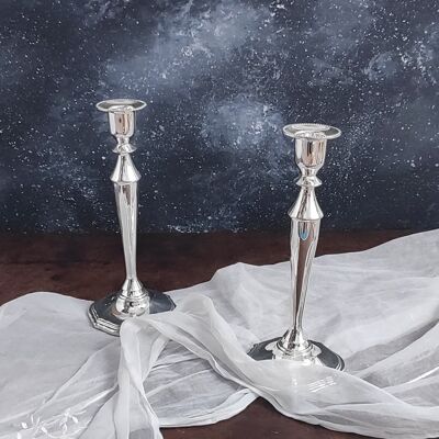 Pair of shiny English candlesticks