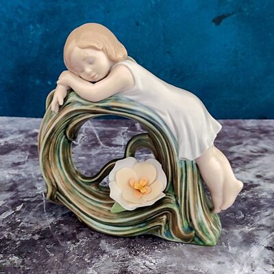 Lladro sleeping girl figurine