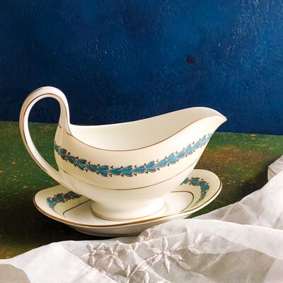 Wedgwood gravy boat with light blue pattern saucer