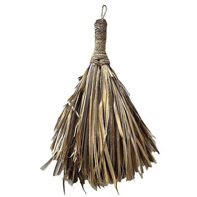 Small decorative broom made with palm leaves.