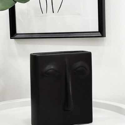 Schwarze Vase mit quadratischem Gesicht