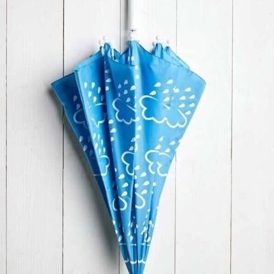 Paraguas para niños pequeños que revela los colores en azul bebé