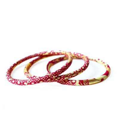 Red/ecru/golden wax bracelets