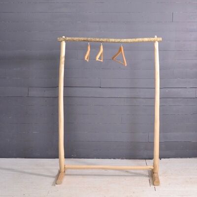 Handmade wooden clothes rack, with a branch