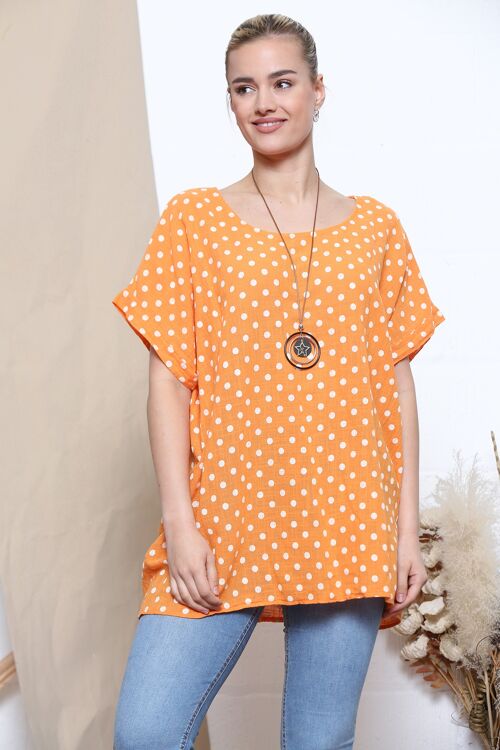 Orange polka dot print top with necklace