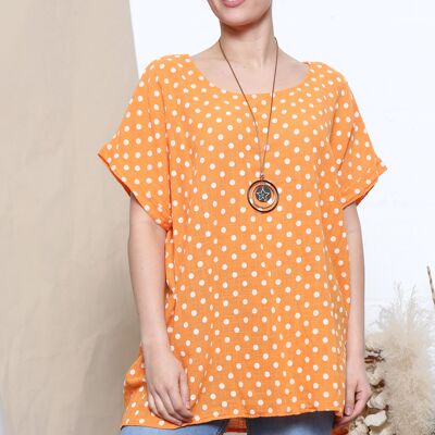 Orange polka dot print top with necklace