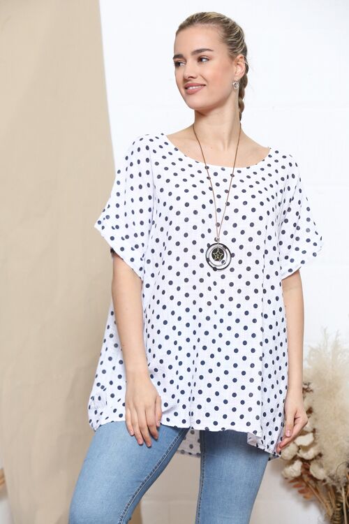 White polka dot print top with necklace