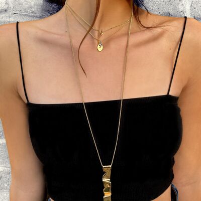 Gold wave pendant necklace