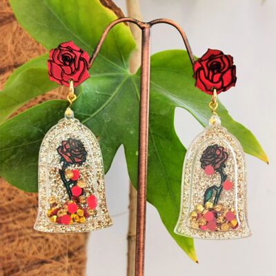 Boucles d'oreilles secoueur rose magique