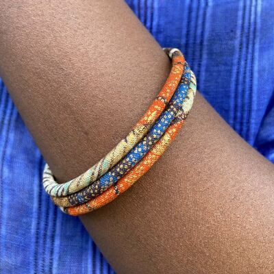 Pulseras de cera africana azul/naranja/crudo/dorado