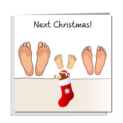 Carte de Noël du nouveau bébé - Trois ensembles de pieds dans le lit