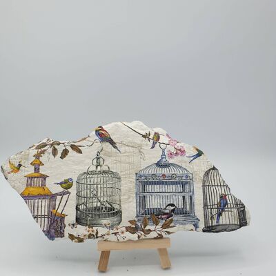 Ardesia decorata con gabbia per uccelli
