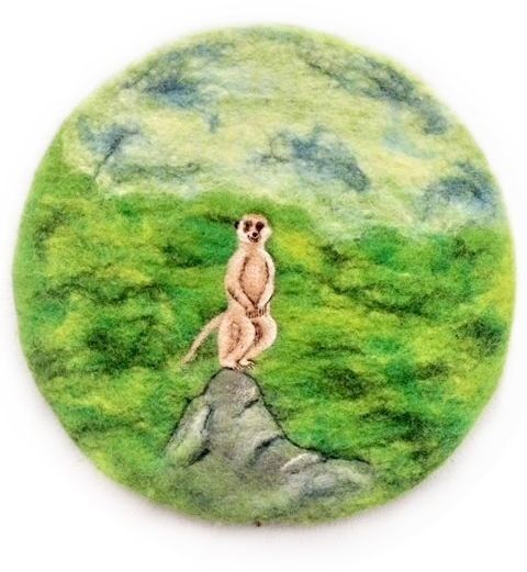 Cuscino da seduta in feltro verde con motivo suricato, circa 38 cm di diametro