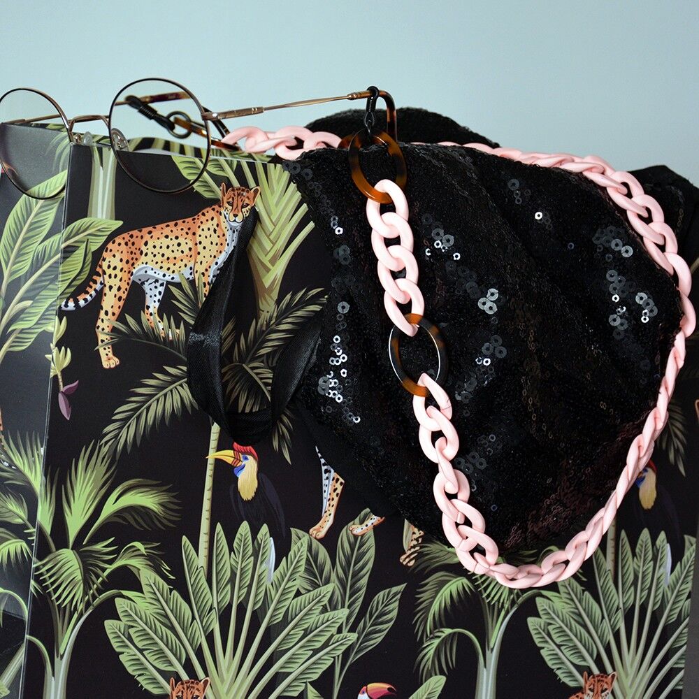 Catena per occhiali in acrilico rosa pastello con anelli in acetato - modello "Volupté".