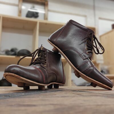 Pair of leather cleats