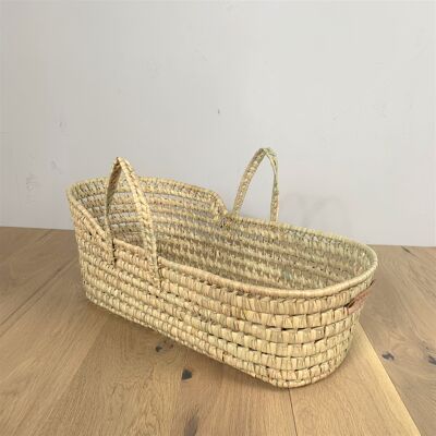 Palm leaf doll bassinet