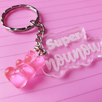 Schlüsselanhänger aus transparentem Plexiglas und Super-Nanny-Teddybär