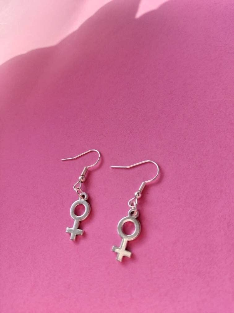 Female deals symbol earrings