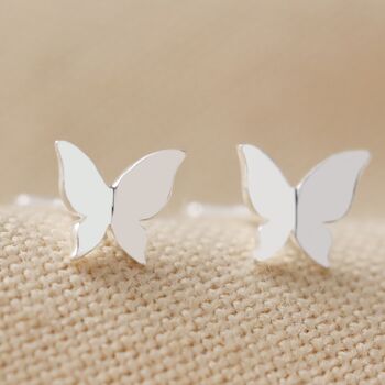 Puces d'oreilles minuscules papillons en argent brossé