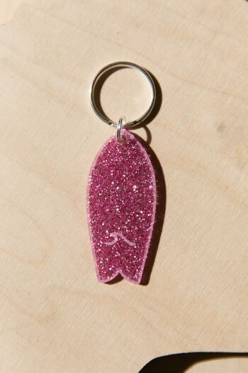 Porte-clés planche de surf glitter rose motif vague 2
