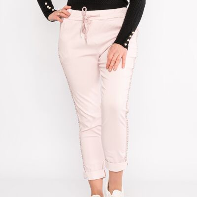 Pantaloni magici cropped rosa elasticizzati con striscia laterale borchiata