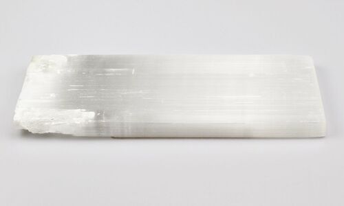 Plaque de selenite 15X35 cm Plaque de sélénite brute de 15X35 cm sur 1,5 cm d'épaisseur.