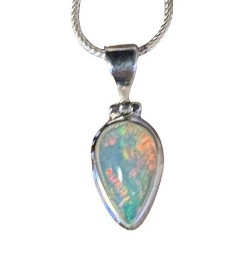 Welo Opal pendant from Ethiopia N°1 - Height 1.6 cm x width 1 cm in 925 silver excluding bail