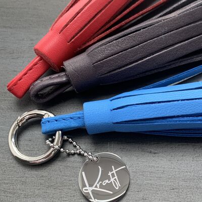 KRAFT, mantra charm with leather tassel and carabiner ring