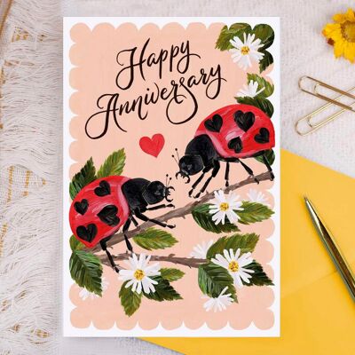 Cartolina d'auguri di coccinelle di buon anniversario