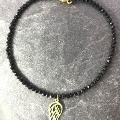 Bracelet avec pendentif pierres noires aile acier inoxydable or