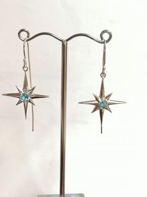 Star earrings hand made from Sterling Silver set with a Blue Topaz stone