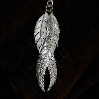 Feather pendant made from 2 Silver feathers with a 9ct gold 'Vein'