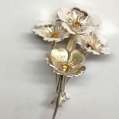 Spilla Primula con 4 citrini e realizzata in argento sterling