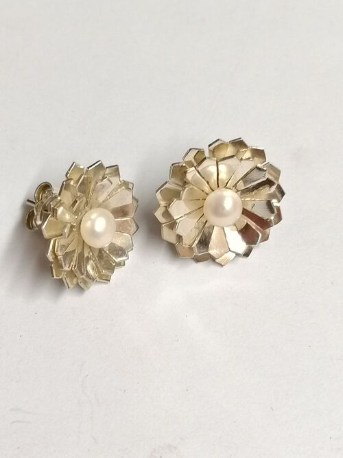 Chicory studs hand made from silver set with a Pearl