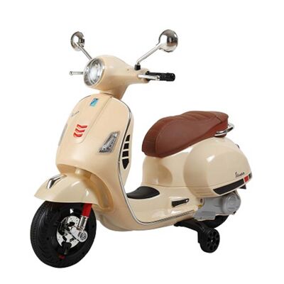 Cream Vespa electric motorcycle