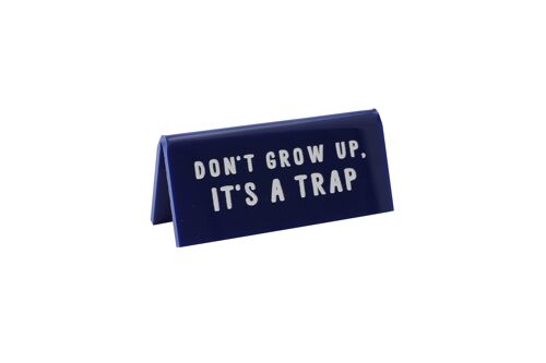 Don't Grow Up, It's a Trap' Blue Desk Sign