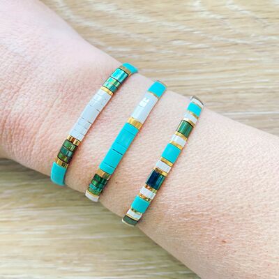 Bracelet in glass beads and turquoise, white and green cord model Huira Model 1