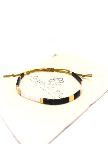 Bracelet Huira noir ivoire et doré en perles de verre et cordon Modèle 1 2