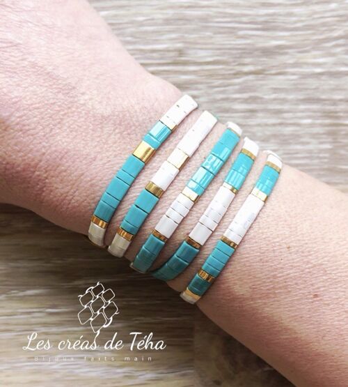 Bracelet Huira turquoise, blanc et doré en perles de verre et cordon Modèle 1